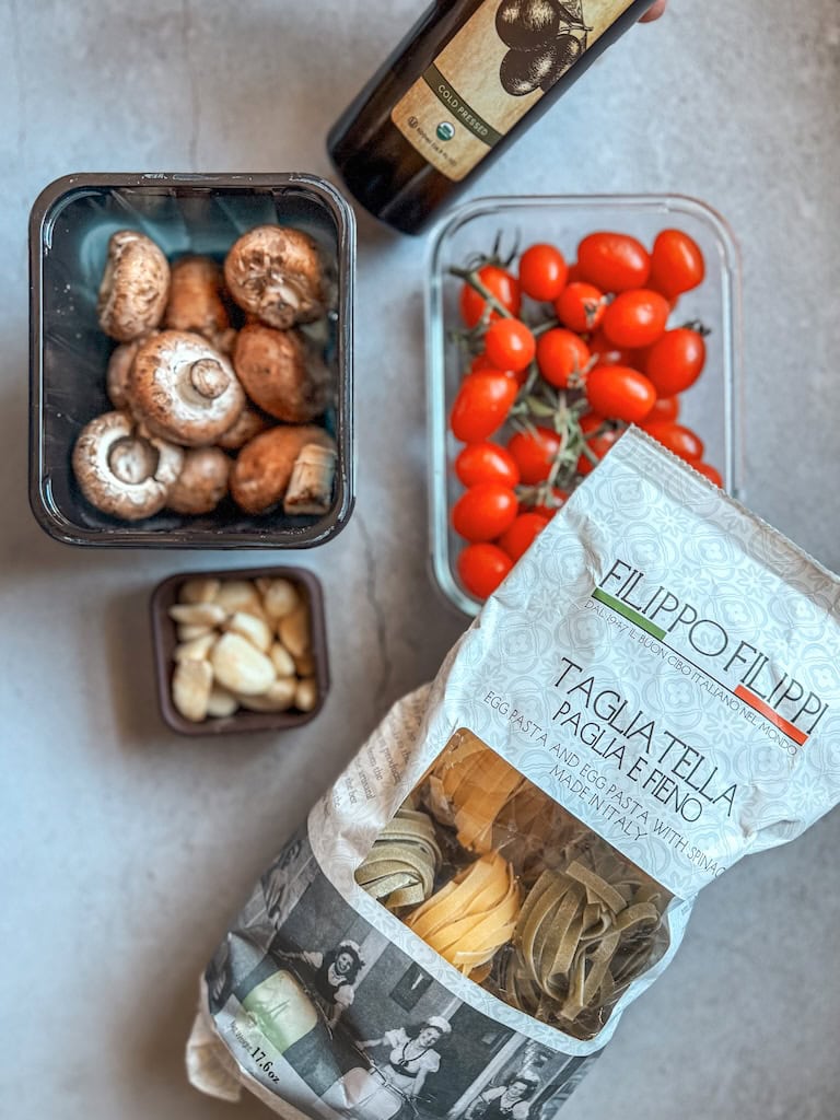 A quick and delicious spinach pasta with sautéed mushrooms, cherry tomatoes, garlic, and herbs. Perfect for weeknights or cozy date nights!