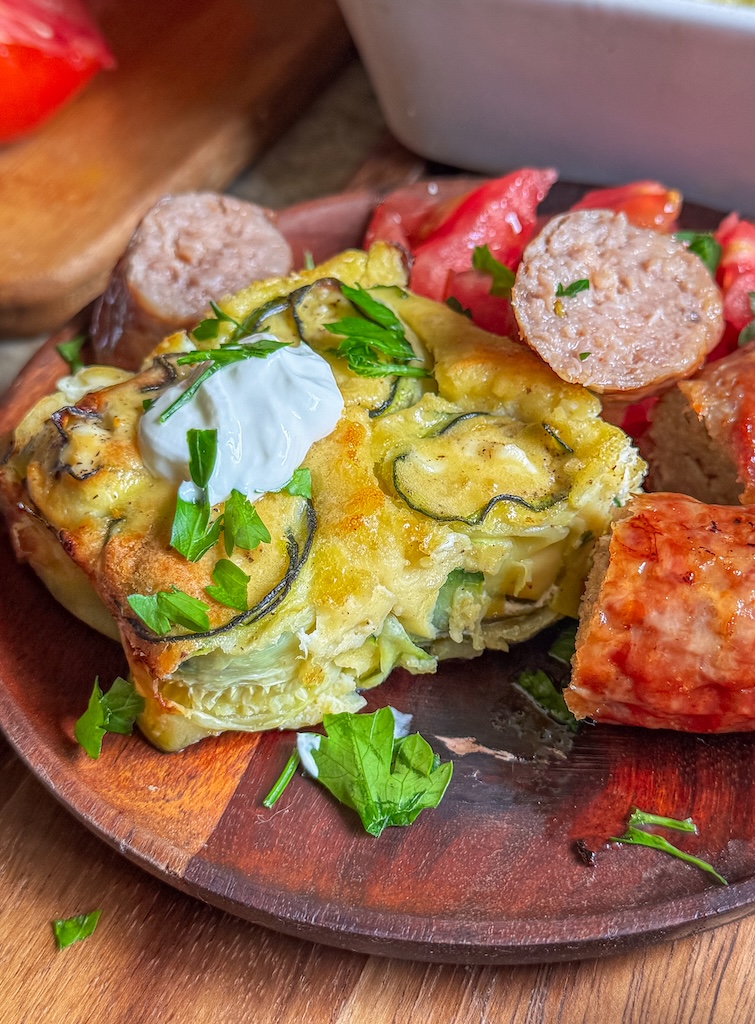These Cheese Zucchini Stuffed Rolls are filled with feta and cream cheese, then baked in a creamy egg mixture until tender, golden, and delicious.