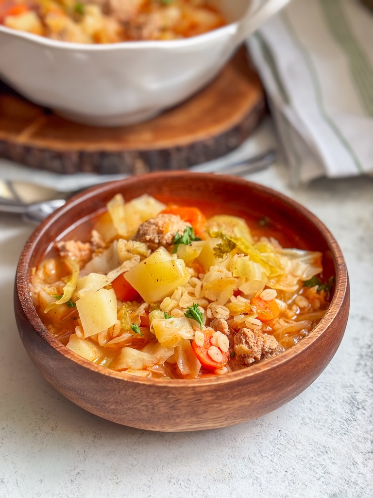 There is something incredibly satisfying about making a meal with vegetables you've grown yourself. While I didn't have enough cabbage from my own garden to make this entire pot of soup, I was still so excited to harvest fresh vegetables, get some from the farmers market, and cook something nourishing for my family.
