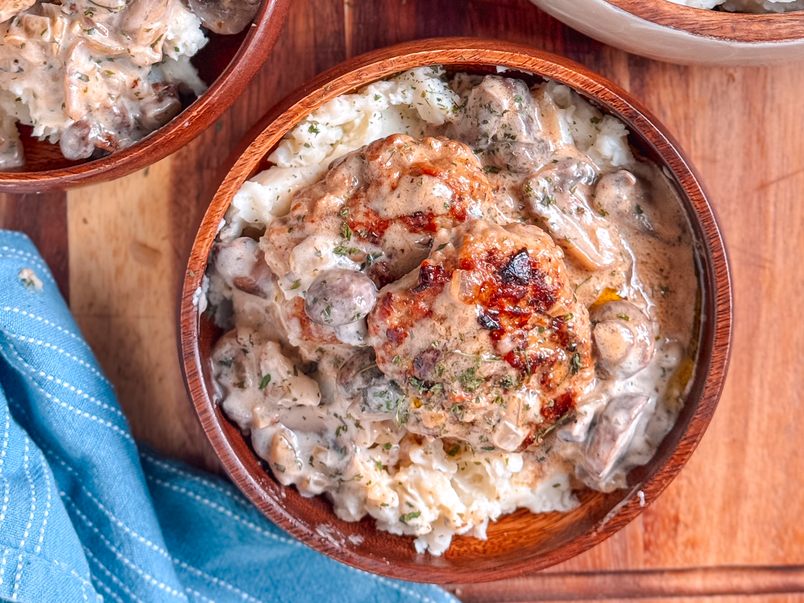 Juicy turkey patties are seared until golden and simmered in a creamy mushroom sauce. An easy skillet dinner that’s perfect with mashed potatoes.