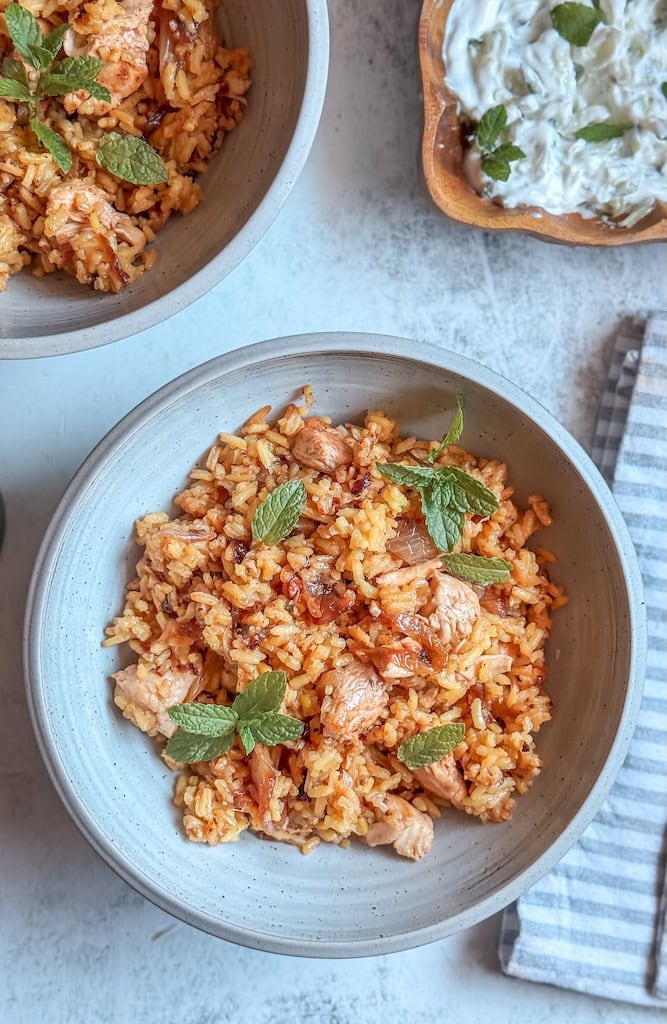 Fragrant chicken biryani made with spiced yogurt-marinated chicken, basmati rice, and caramelized onions. A comforting one-pot meal full of warmth and flavor.