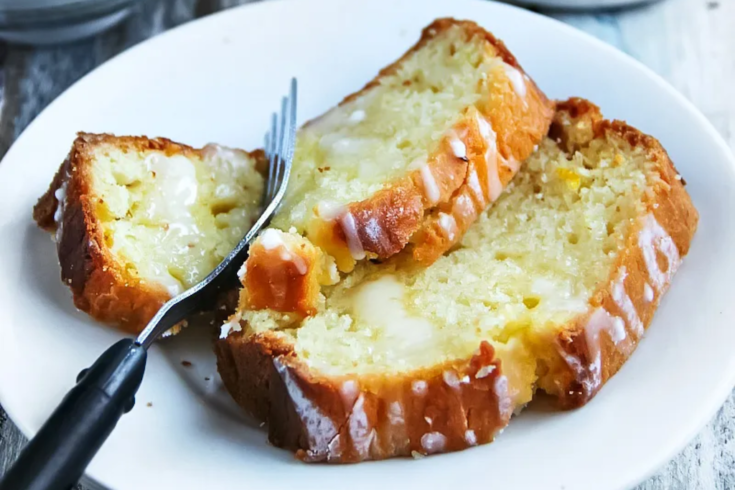 This Meyer Lemon Pound Cake is moist, buttery, and bursting with fresh citrus flavor. Made with yogurt, lemon syrup, and a tangy glaze for the perfect dessert.