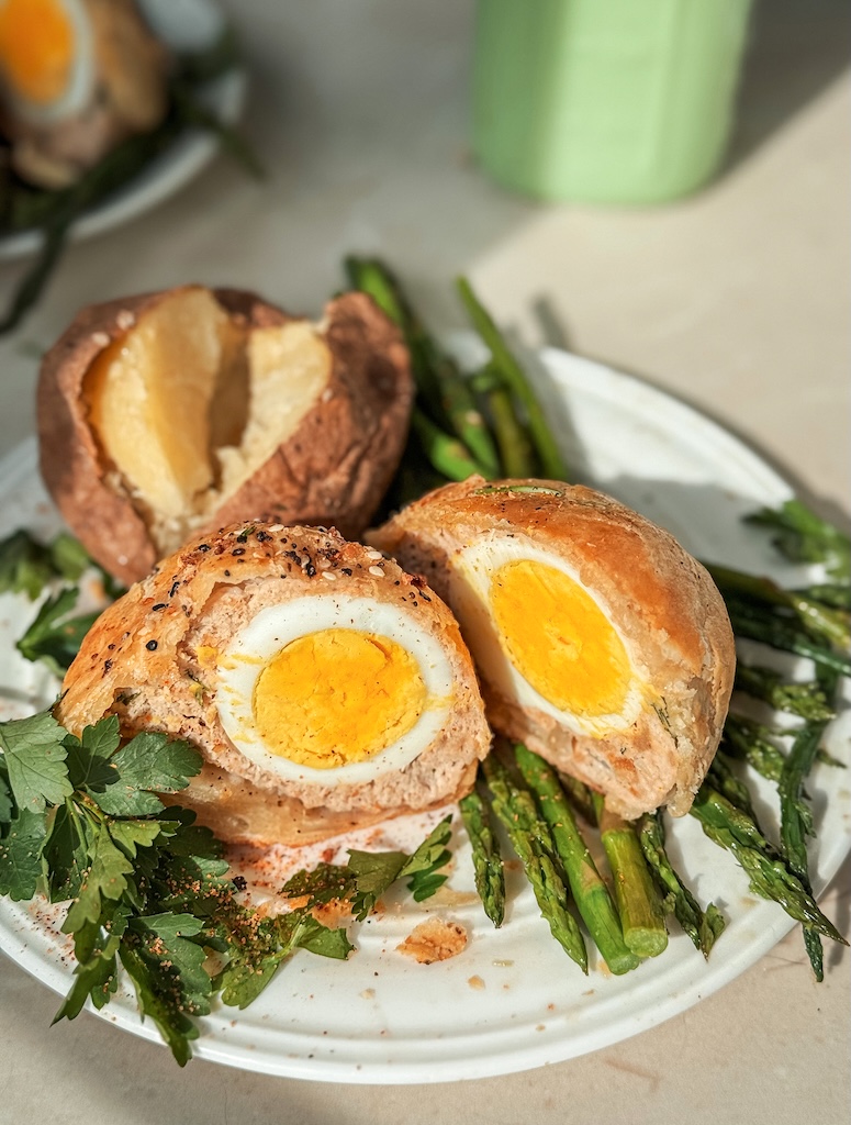 Craving a comforting twist on a British pub classic? These Baked Scotch Eggs Puff Pastry are everything you didn’t know you needed—crispy, savory, satisfying, and oven-baked to golden perfection.Instead of the usual deep-fried version, this recipe wraps soft-boiled eggs in a seasoned turkey sausage mix, then tucks them into flaky puff pastry before baking until golden and crisp. The result? A perfectly balanced bite: warm, creamy egg center, juicy meat, and a buttery, crisp shell.They’re simple enough for a weekday meal and impressive enough for a brunch board or holiday spread. Serve them warm with mashed potatoes, potato wedges, or roasted veggies. Or enjoy them cold, tucked into a lunchbox or picnic basket with a zippy vinaigrette, tangy pickles, or mixed greens.What makes these baked Scotch eggs even better? They’re freezer-friendly, easy to customize, and just as tasty the next day. Try using ground chicken or pork, mixing in herbs, or adding a hint of Dijon mustard or smoked paprika for a flavor boost.Whether you’re planning a cozy weekend breakfast or prepping a crowd-pleasing appetizer, these savory beauties are sure to hit the spot.Why You’ll Love This Recipe:No deep-frying required – baked for a lighter, cleaner option
Great warm or cold – perfect for picnics, road trips, or lunchboxes
Versatile and make-ahead friendly – easy to prep, freeze, and reheat
Packed with protein and flavor – a satisfying meal or snack any time
Recipes you might like:CREAMY SPINACH PUFF PASTRYPEACH TART WITH LEMON THYMECHICKEN CORDON BLEUCLASSIC BEER BATTERED FRIED FISHTried it? I’d love to hear your thoughts! Leave a comment below and don’t forget to tag me on Instagram @sandraseasycooking with the hashtag #sandraseasycooking.Your creations always make my day—and I just might share your version too!