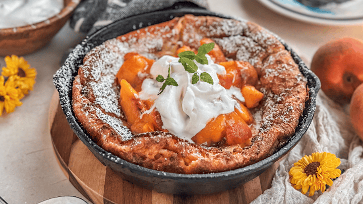 There’s just something magical about pancakes. From fluffy stacks to savory crepes, they’re a comfort food that never fails to bring people together. But if you’ve never tried a Dutch Baby, especially with peaches, also known as a German pancake, you’re in for a real treat. Unlike traditional pancakes, this one is baked in the oven, which means you get a light, puffy, golden creation that looks as beautiful as it tastes.