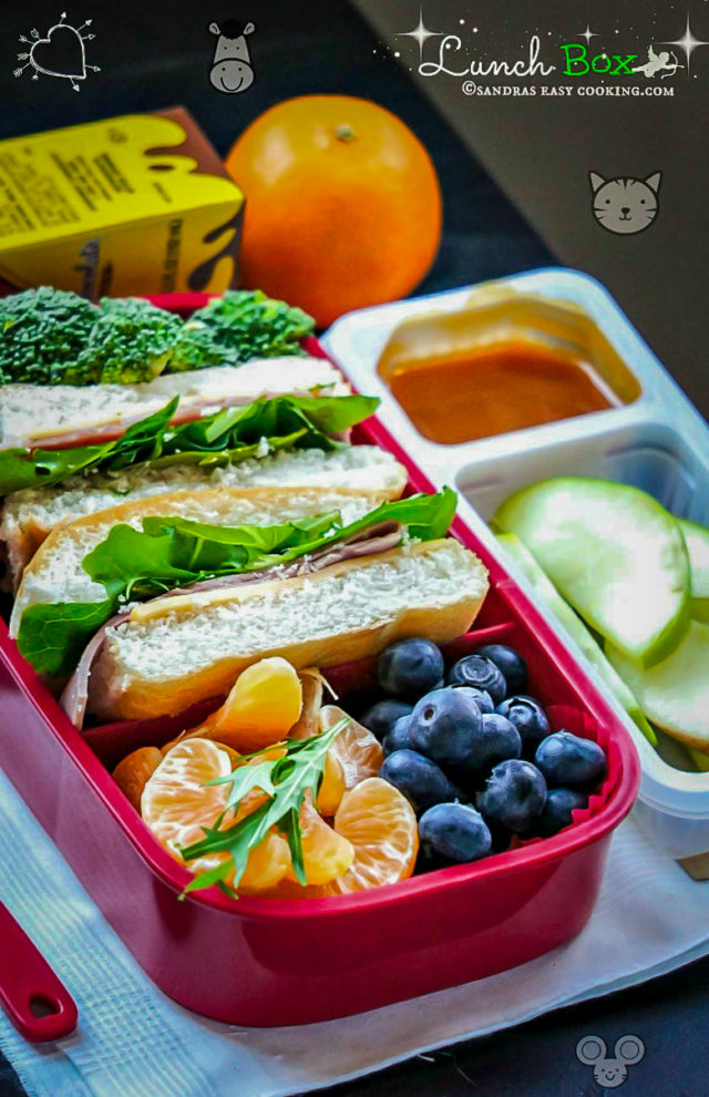 https://www.sandraseasycooking.com/wp-content/uploads/2018/12/Lunch-Box-Ham-sandwich-with-Fresh-Fruits-and-Veggies-1-640x990.jpg