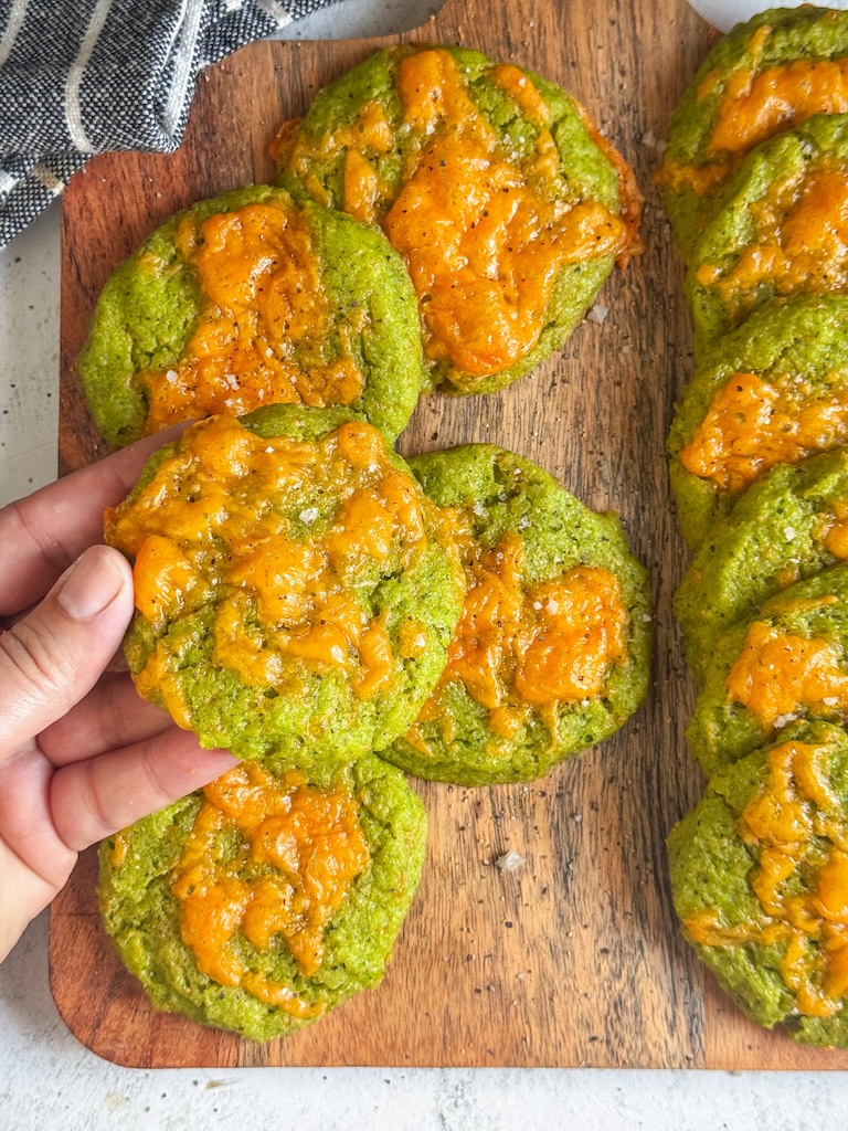 Cheesy baked spinach rice cakes made with leftover rice and topped with melted cheddar cheese.